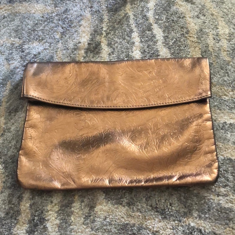 Golden leather clutch